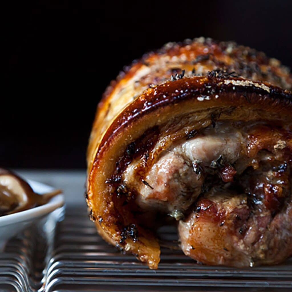 A view of a rolled crispy pork belly