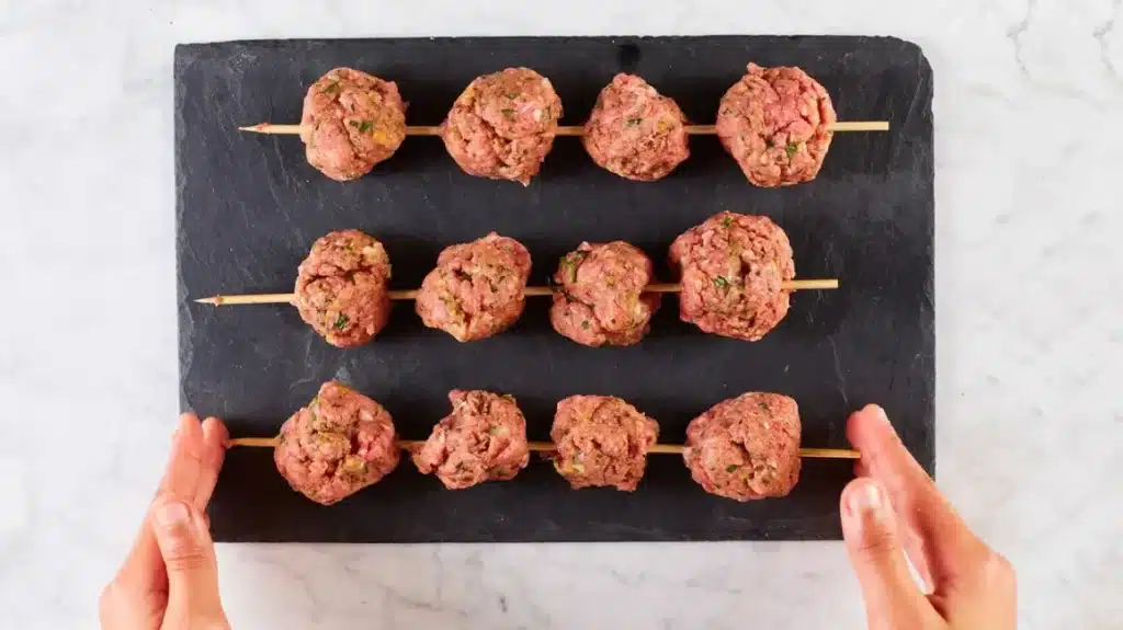 A view of ground turkey balls on sticks