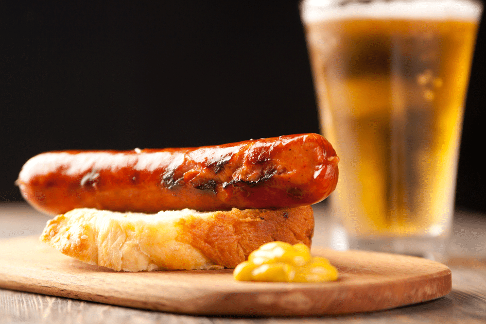 Bratwurst sausage with beer and mustard