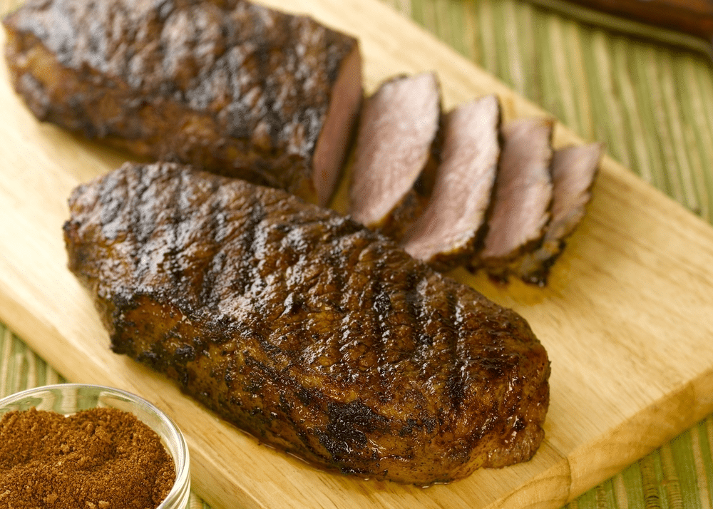 Sliced London Broil on cutting board