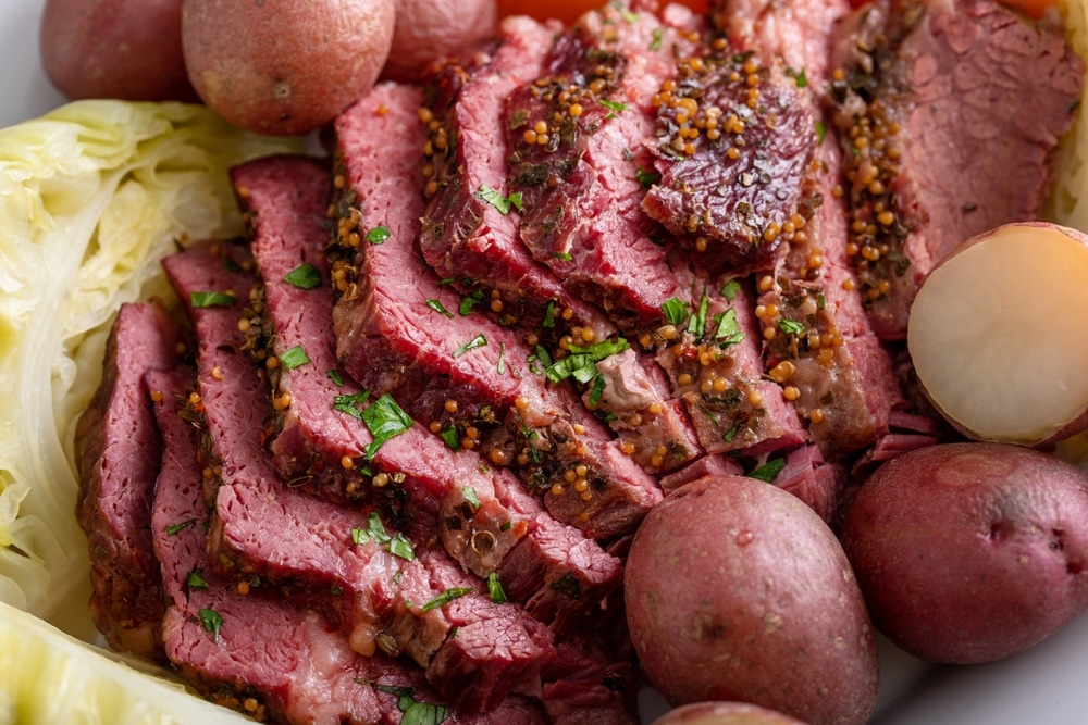 Corned Beef With Cabbage And Potatoes On A Serving Platter