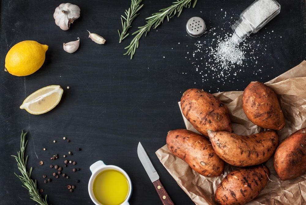 Preparing Rosemary Roasted Sweet Potatoes With Olive Oil Lemon Salt