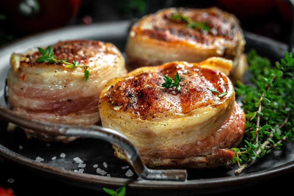 steaks from the beef tenderloin covered bacon