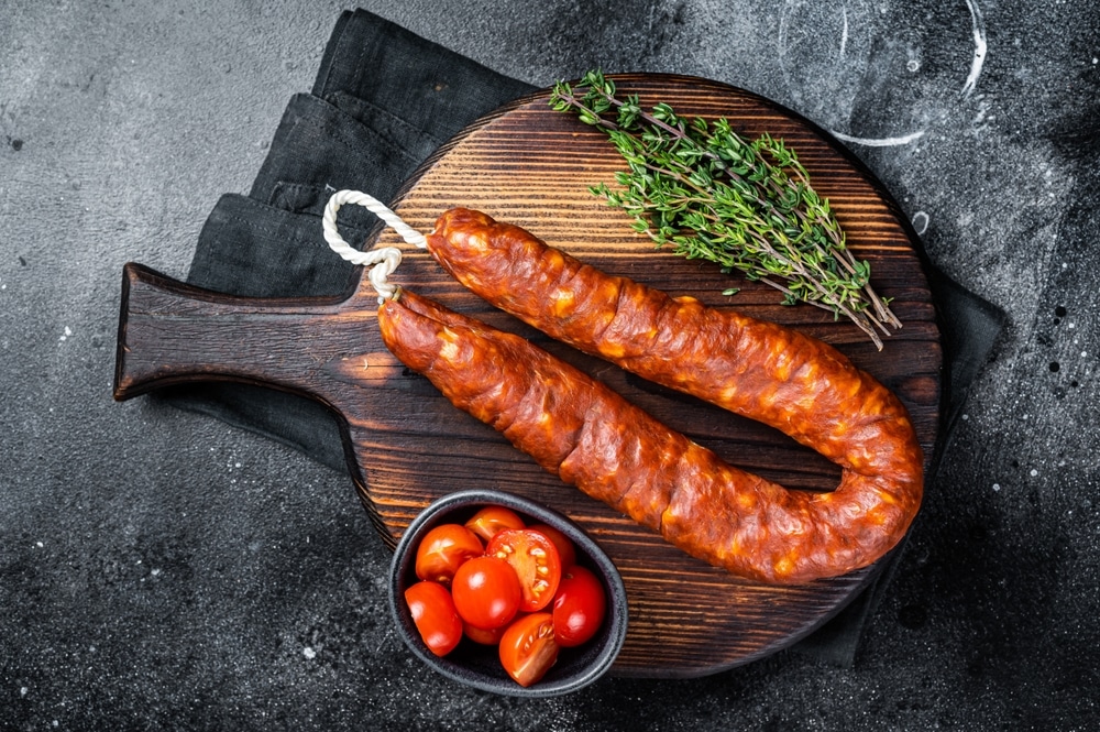 Traditional Spanish Chorizo Sausage Dry Cured Pork Meat Black Background