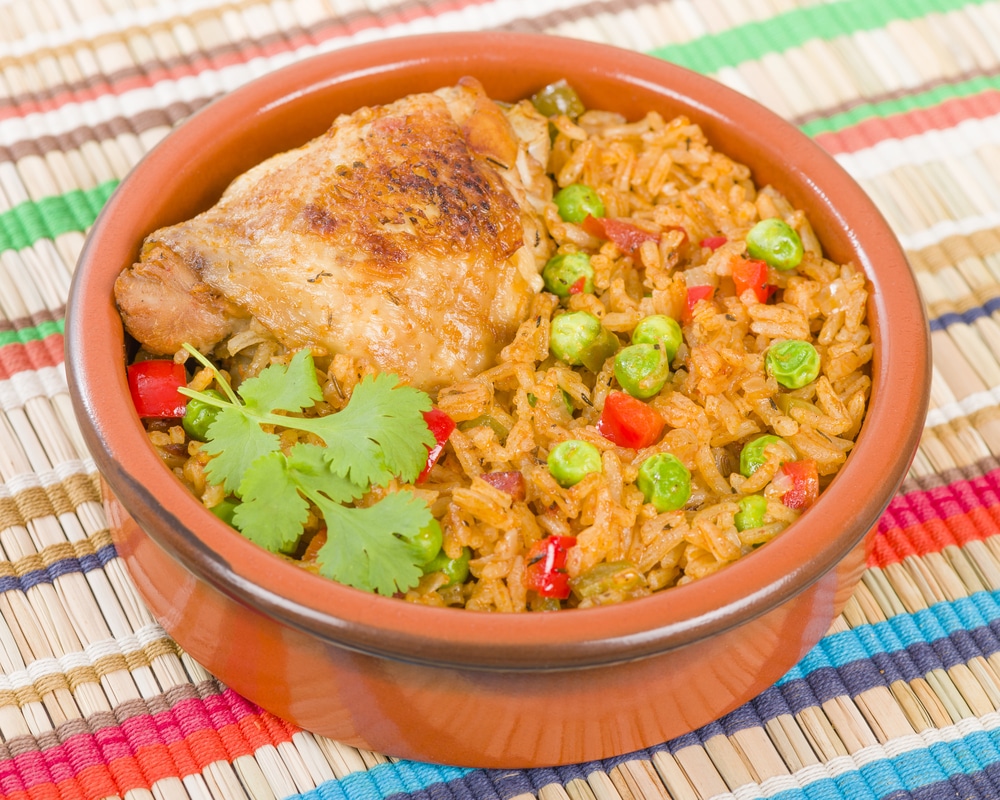 Arroz Con Pollo Chicken and rice cooked with sofrito and beer