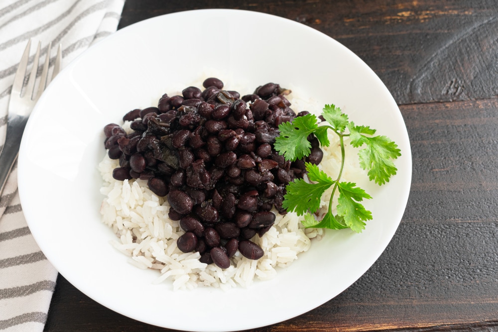 Cuban Black Beans (Frijoles Negros) Served Over White Rice